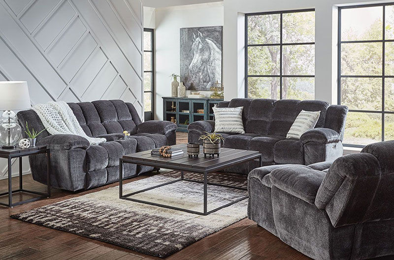 Image of grey sofa, greay loveseat and grey chair in living room